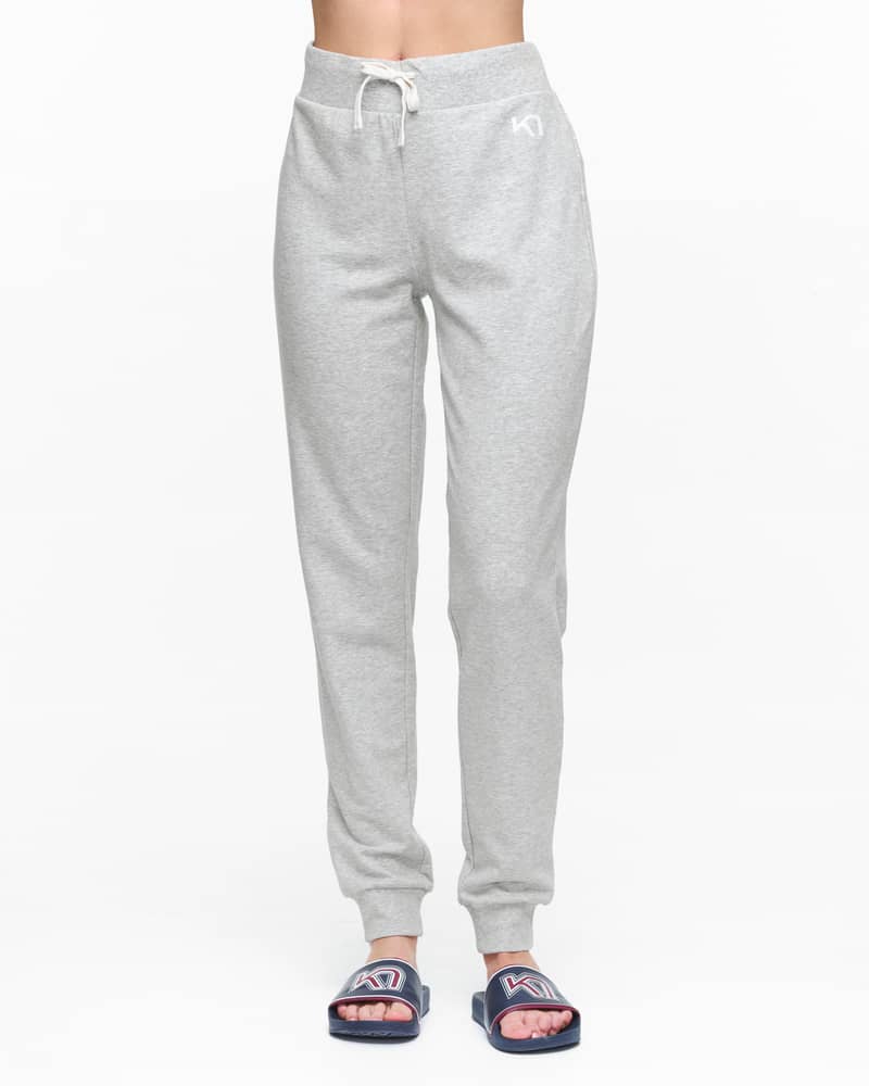 Woman wearing light grey Kari Traa Kari Pants, showing the comfortable fit for lounging or days around town.