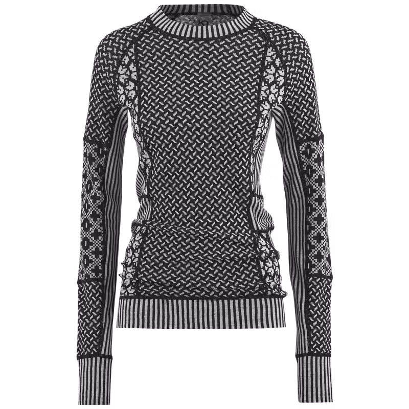 Black Kari Traa Smekker Long Sleeve baselayer with intricate grey jacquard-knit panels on the sleeves, sides, and body for a playful, flattering look.