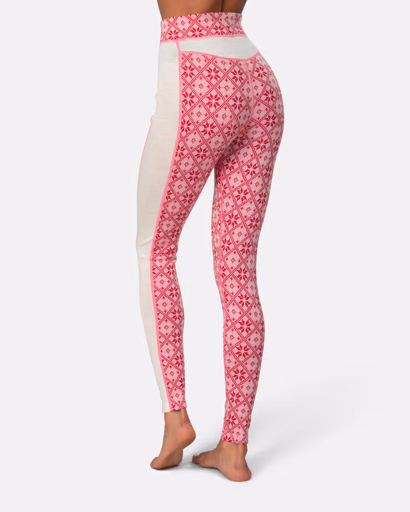 Back view of the pink patterned Kari Traa Rose High Waisted Baselayer Pants, showing the high-waisted design.