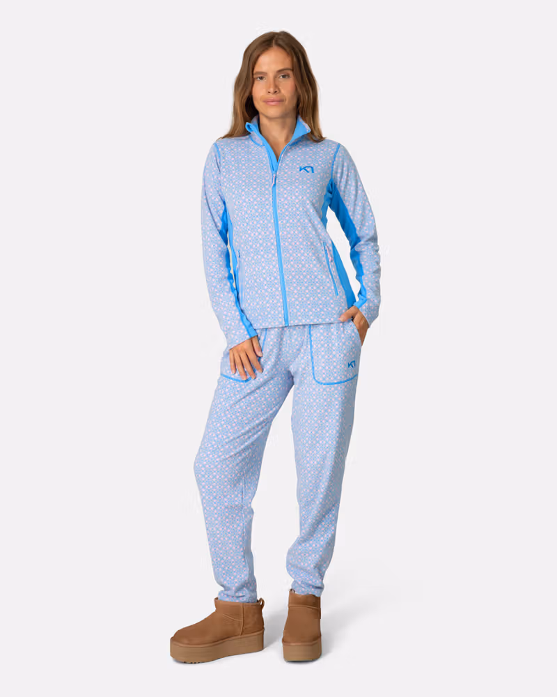 Woman styled in the complete light blue Kari Traa Olga outfit, perfect for lounging or post-adventure comfort.