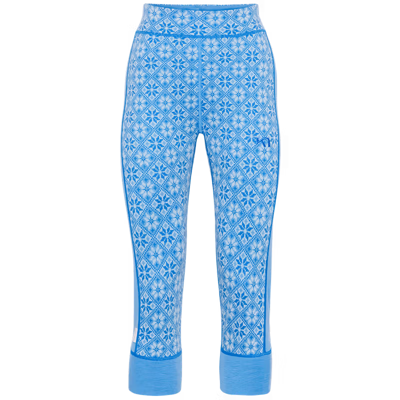 Light blue Kari Traa Rose High Waist Capri with an all-over Nordic pattern, perfect for layering under ski boots.