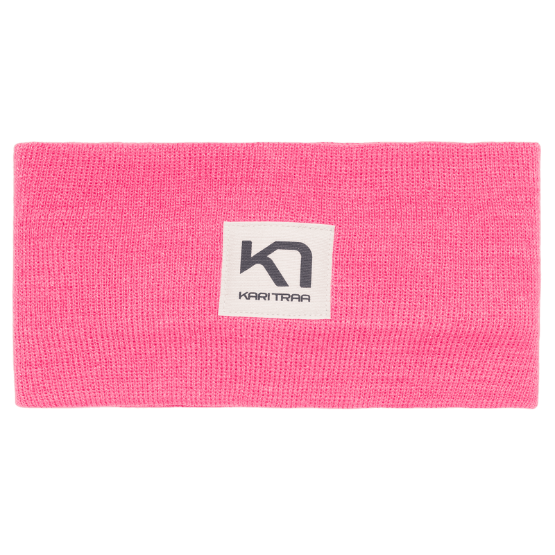 Bright pink Kari Traa Røthe Headband, a lightweight rib knit headband with a double-layer for warmth and comfort.