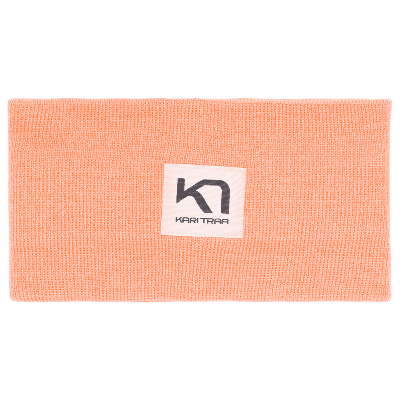 Peach Kari Traa Røthe Headband in a lightweight rib knit, ideal for cool spring and summer evenings.