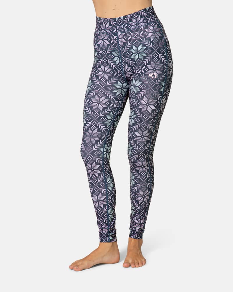 Side view of a woman in grey patterned Kari Traa Fryd High Waist Pants, made from quick-drying stretch fabric.