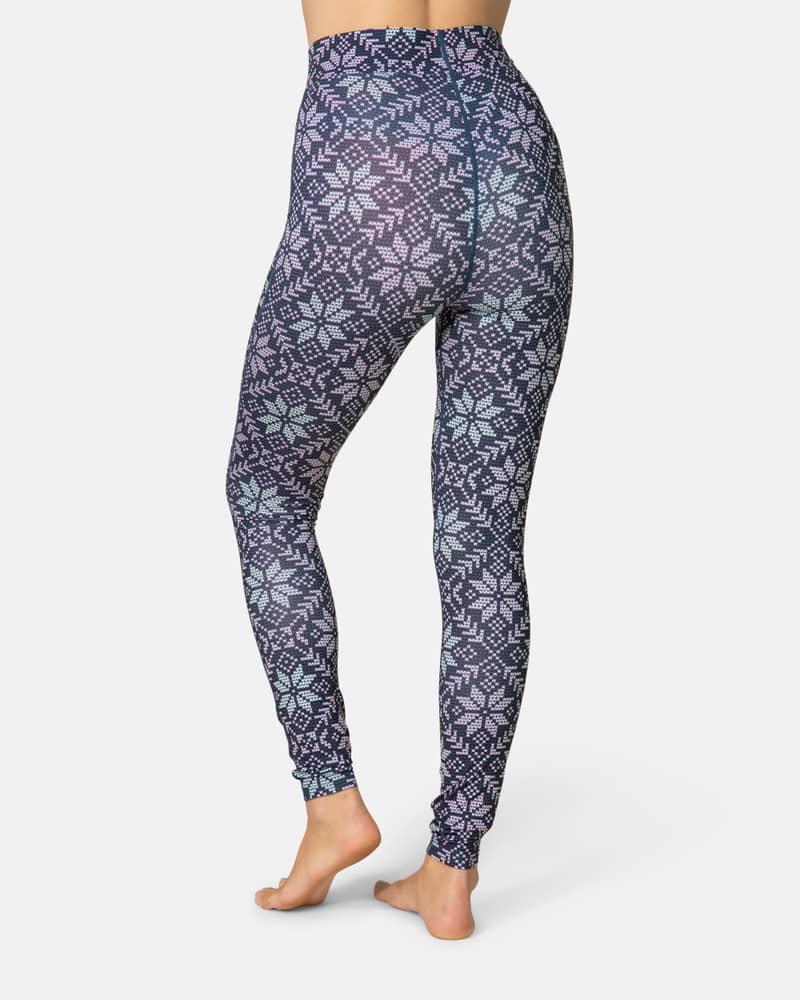 Back view of a woman in grey patterned Kari Traa Fryd High Waist Pants with a comfortable elastic waistband.