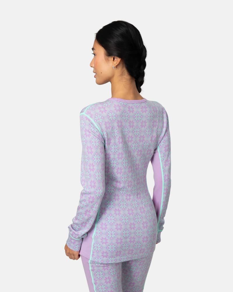 Back view of the lavender Kari Traa Rose Long Sleeve 2.0, highlighting the flattering, slim fit.